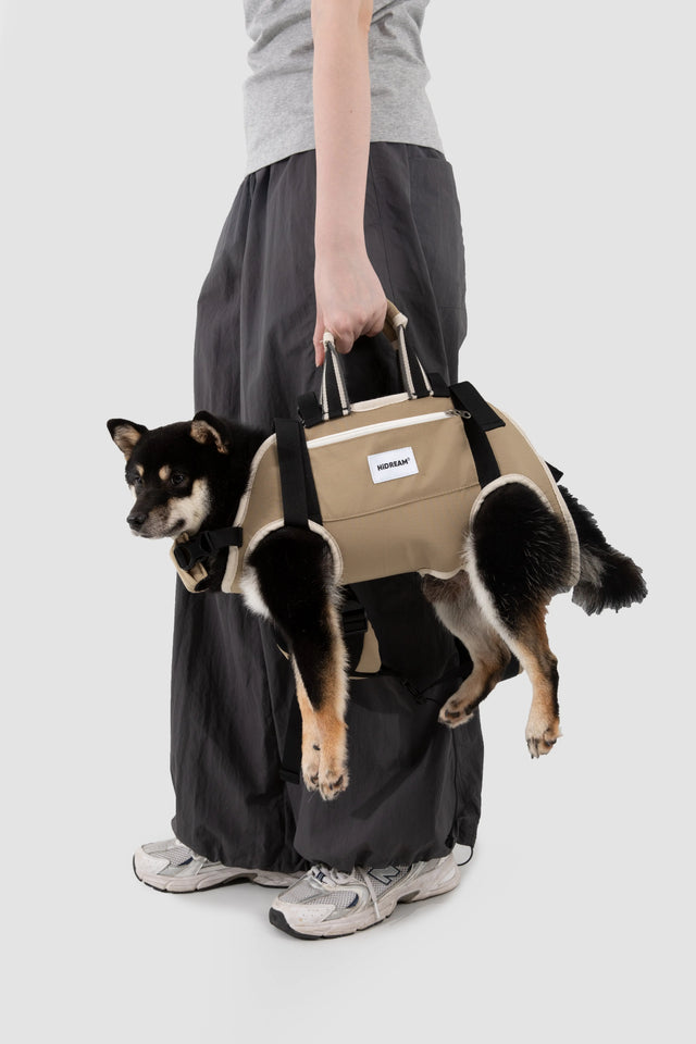SpineEase Pet Backpack Carrier in use – hand-held carrier