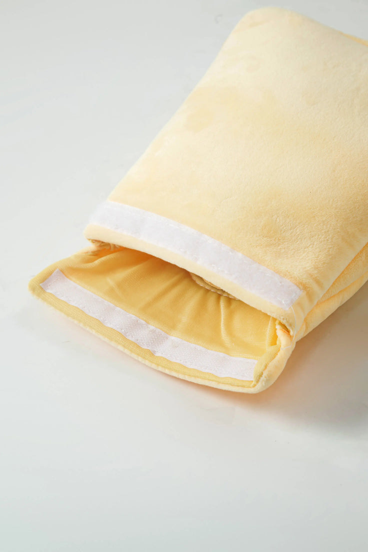 Close-up of the Afternoon Tea plush pouch closure and soft fabric