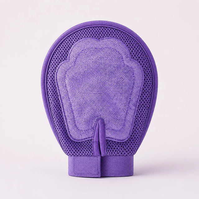 PawSoothe purple grooming glove showing the fabric reverse side and center pull loop