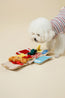 Dog exploring the Picnic Paws Hide-and-Seek Snuffle Toy Set